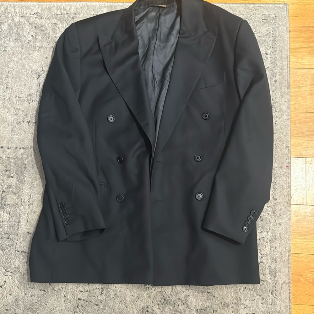 This is a 2 piece men suit in a size 48S.